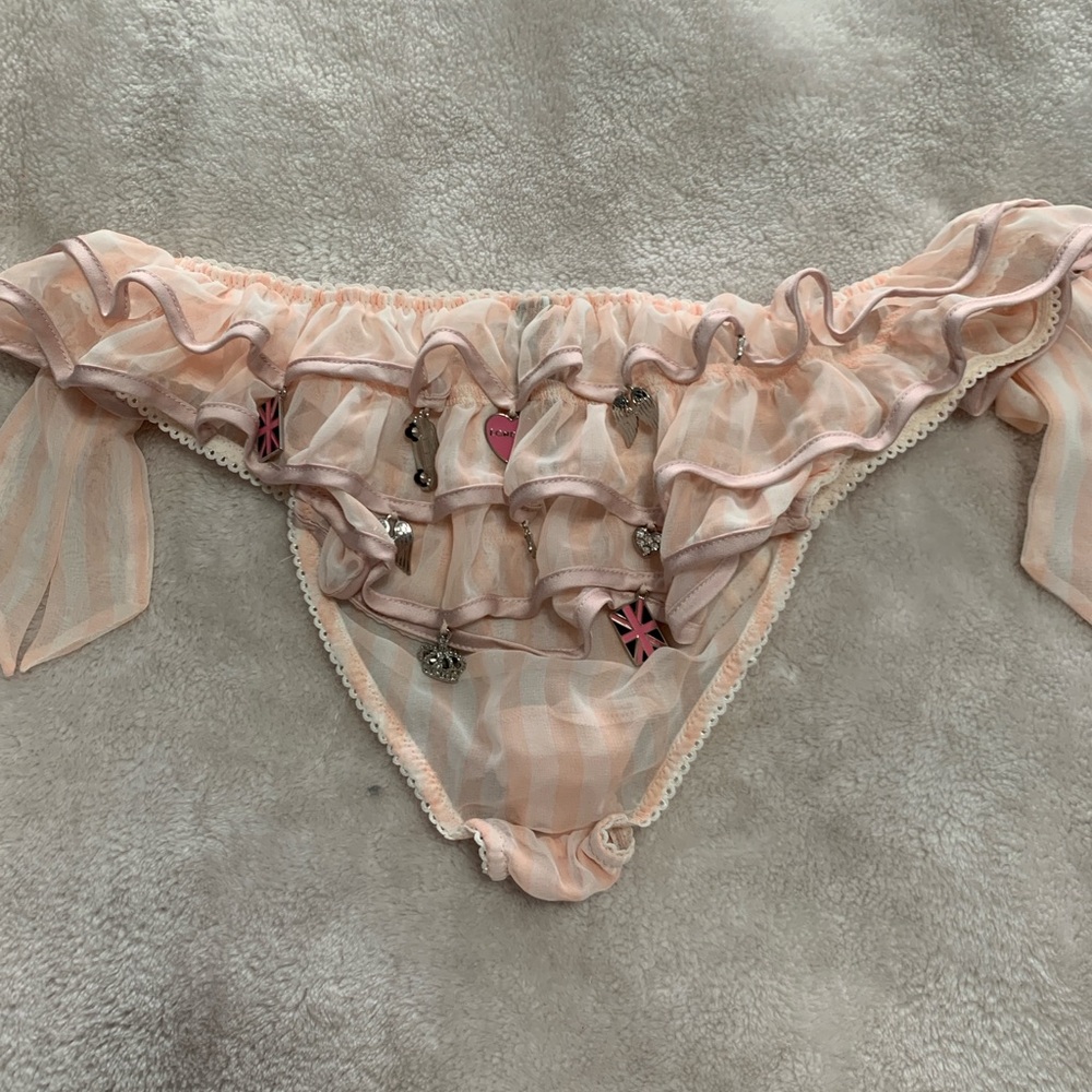 Panty with charms on back